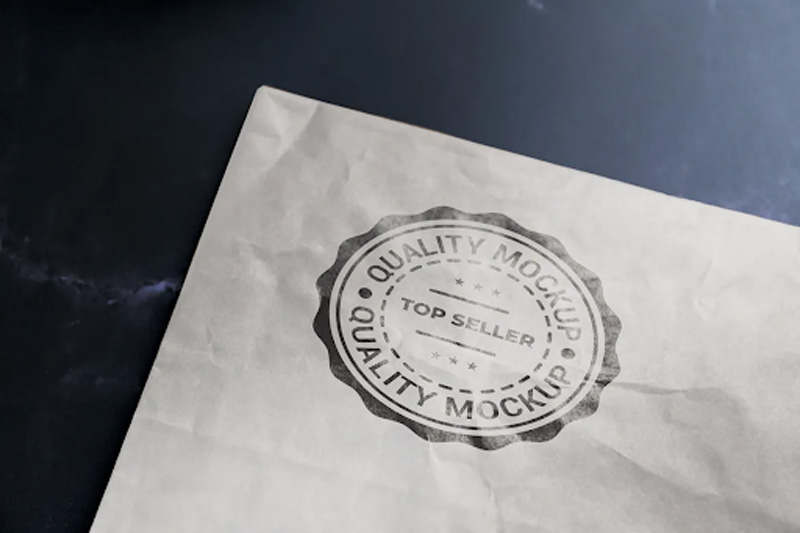 Stamp logo mockup – white kraft paper 7BC6V3G